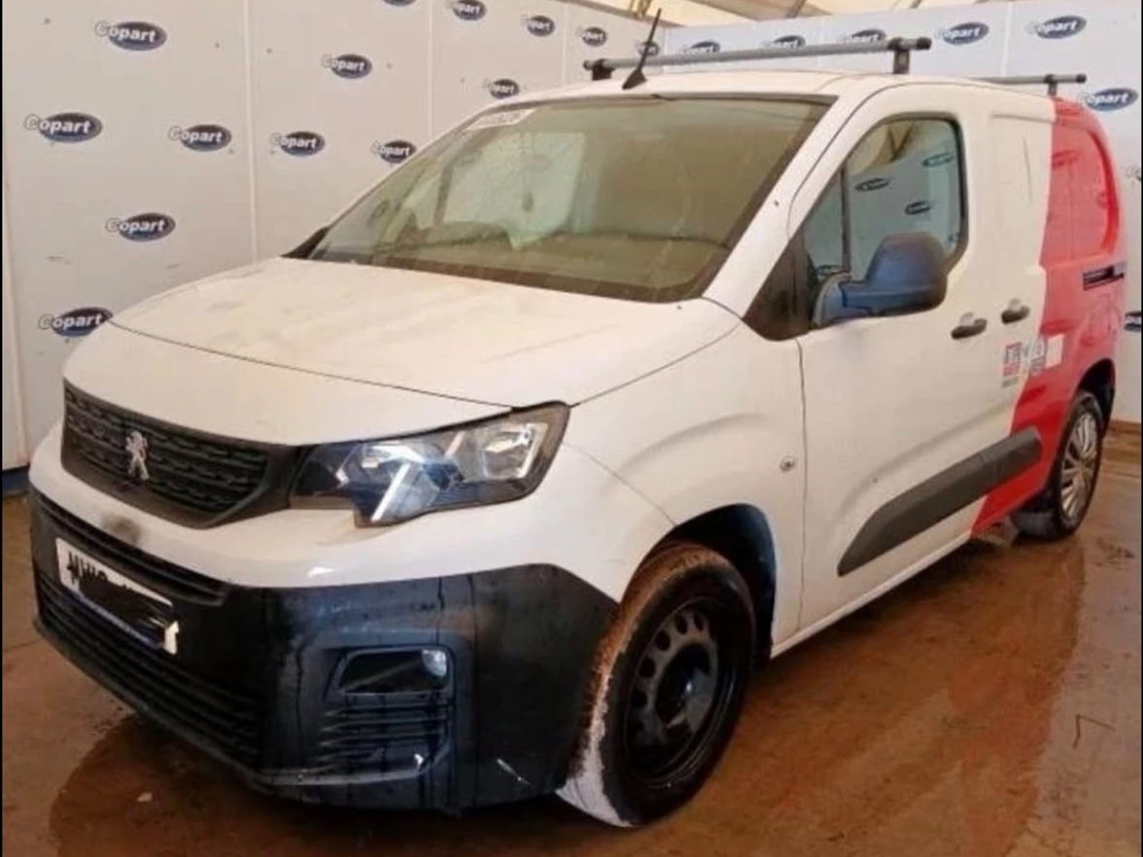 Peugeot Partner van being broken for parts at Allparts Rochdale