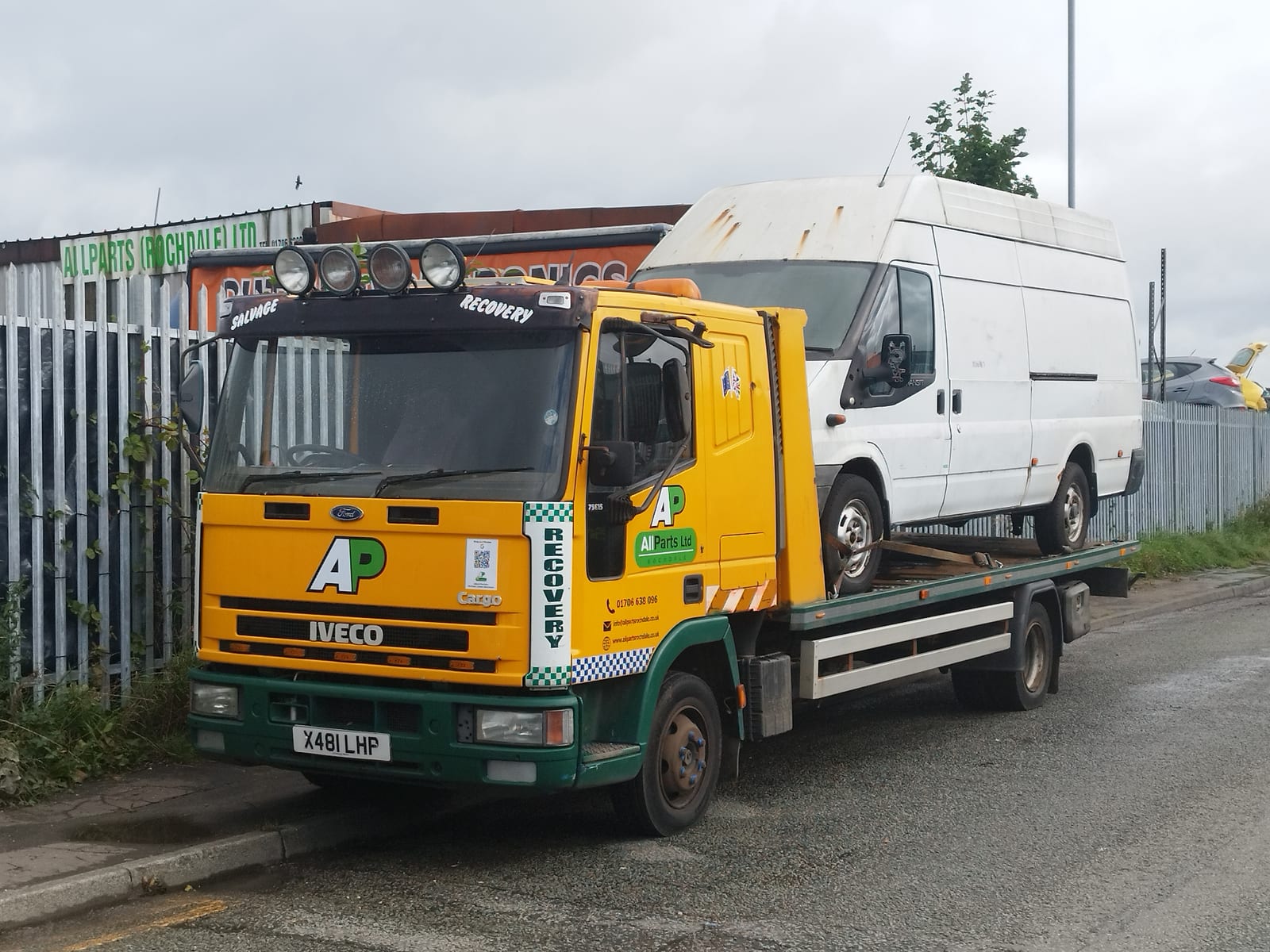 Allparts Rochdale recovery truck loaded with a van outside the Chichester Street yard